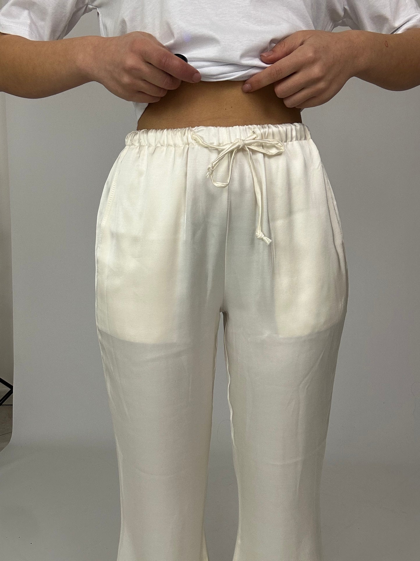 Pantalone zampa in raso lumina