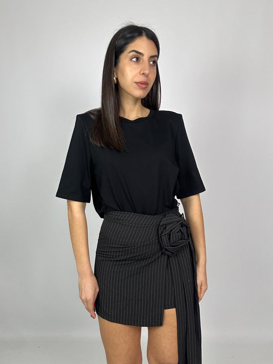 Gonna gessata con fiore lungo