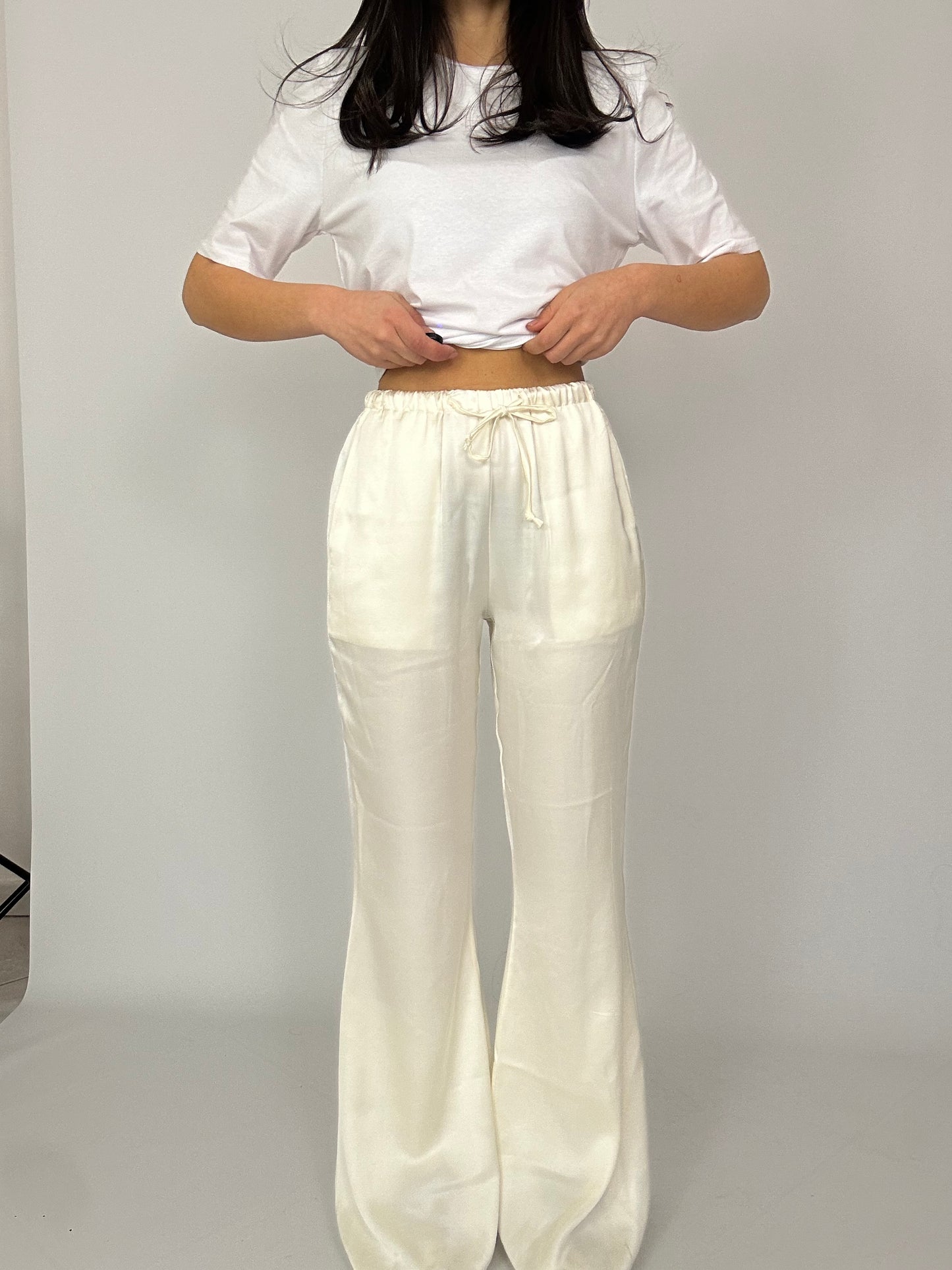 Pantalone zampa in raso lumina