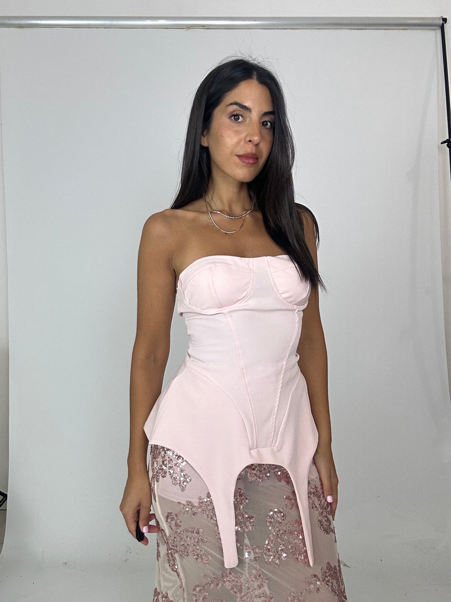 Top rosa con coppe