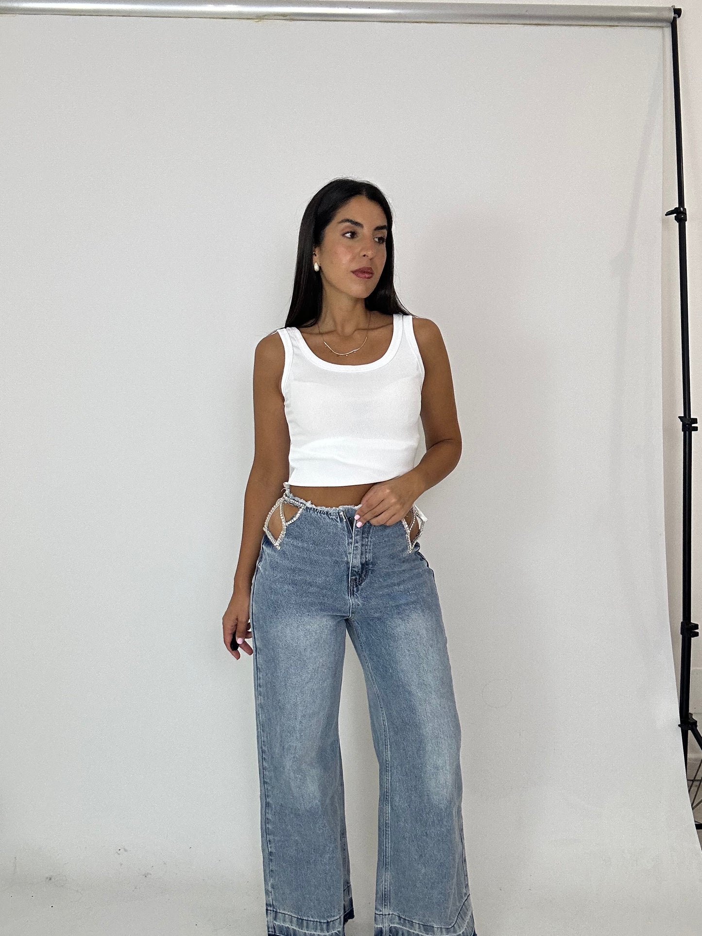 Jeans con stella brillantinata