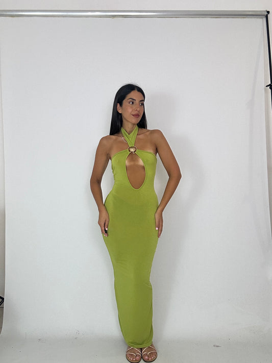 Abito verde con apertura sul seno